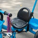 Triciclo Con Timbre Y Manija Direccional Doble Canasto CELESTE