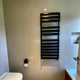 Toallero Radiarte Firenze Agua 1200x450 Negro TFI1200450N